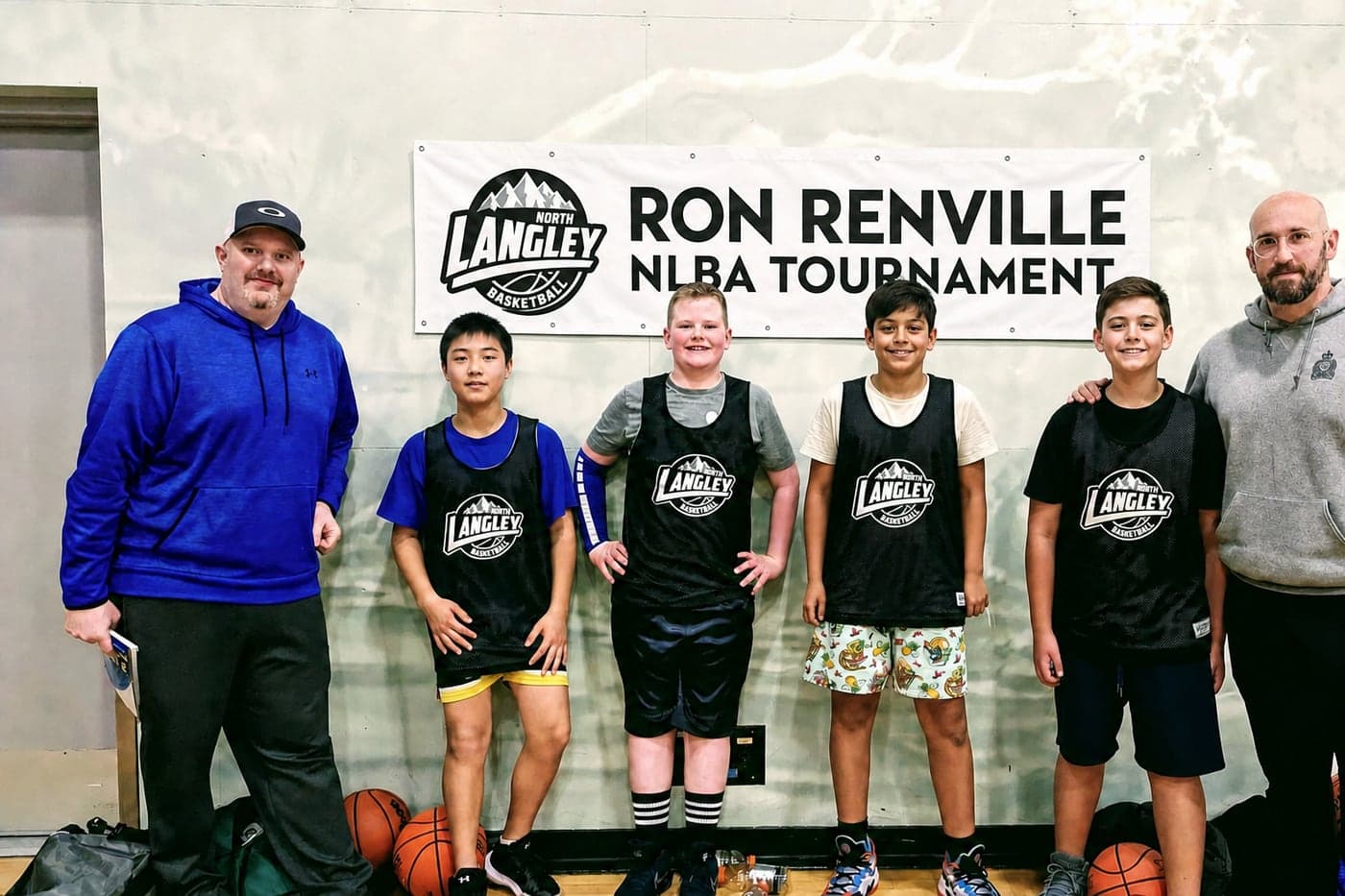 An NLBA team with two coaches at the Ron Renville 3-on-3 Tournament